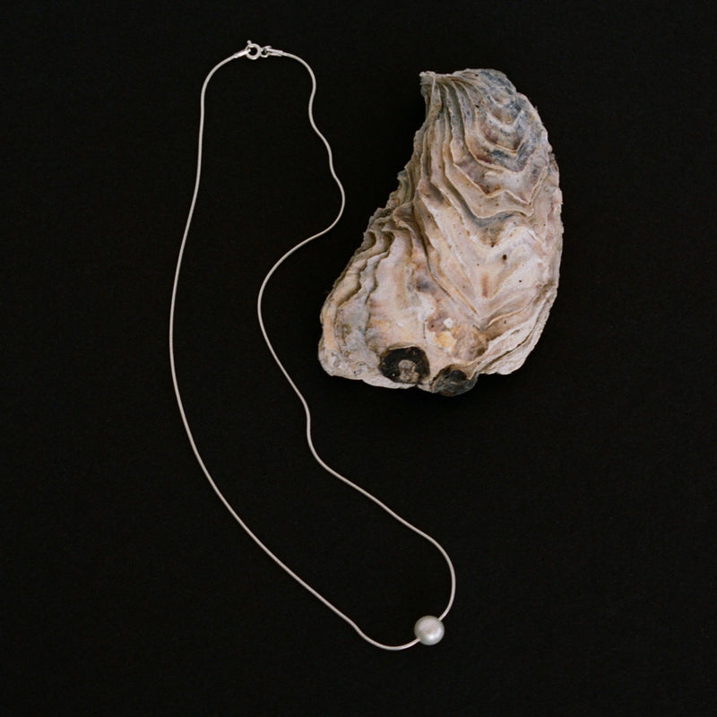 Round freshwater pearl and delicate sterling silver snake chain necklace ethically and locally handcrafted — Tahlais 